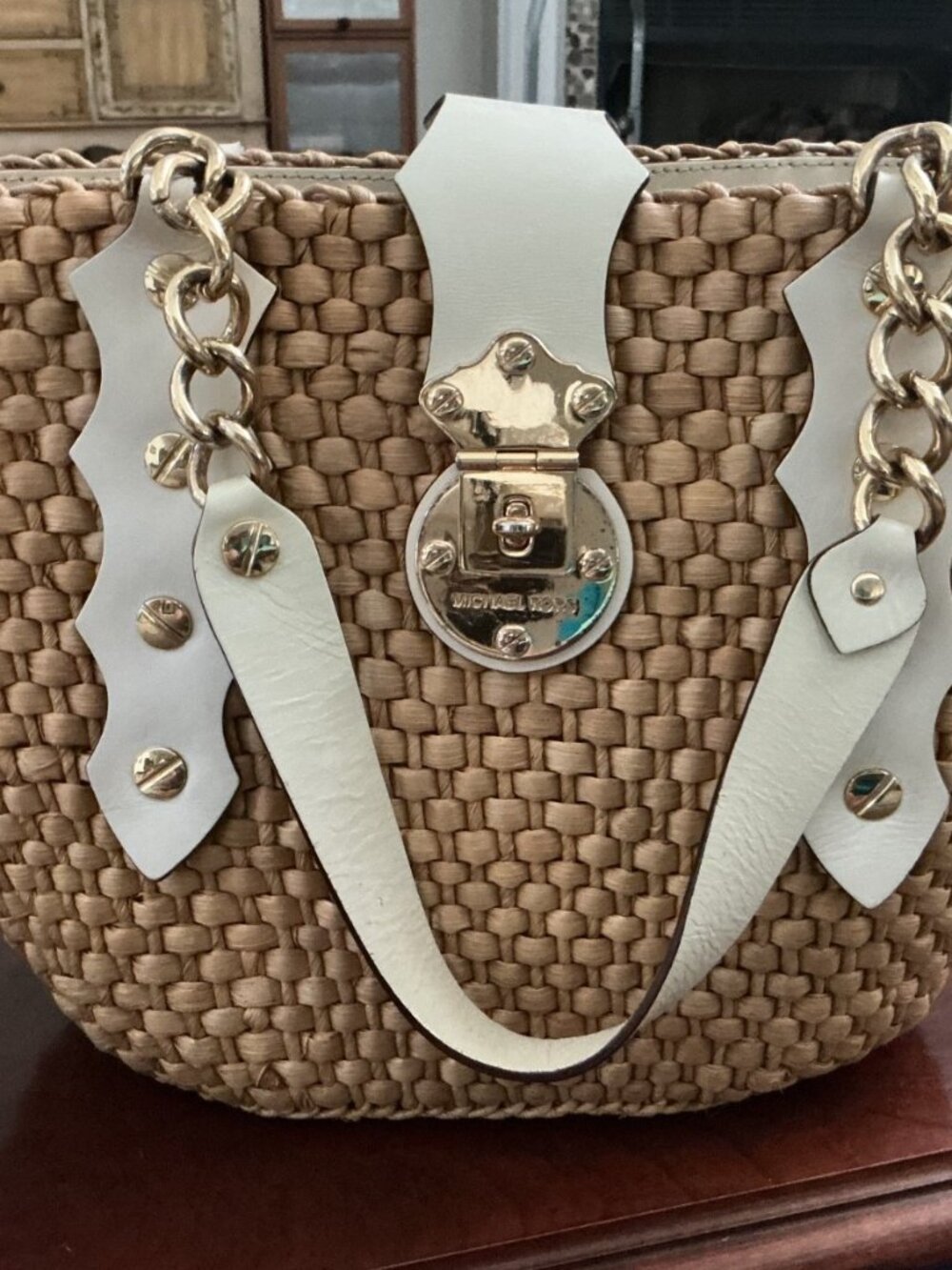 Beautiful Michael Kors large hand bag. Wicker and cream leather with gold accent